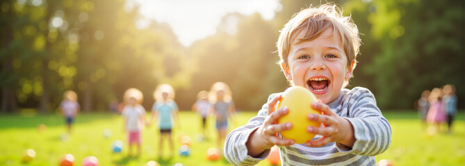 Fototapeta premium Excited child running with an Easter egg during a hunt