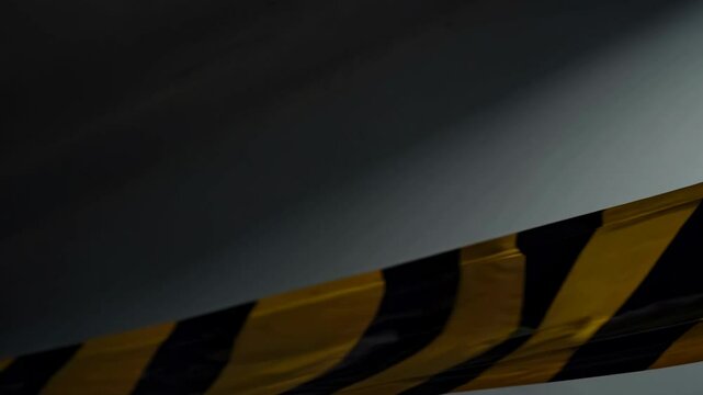 Bullet holes are appearing one by one on a yellow and black caution tape isolated on a white background, creating a sense of danger and urgency