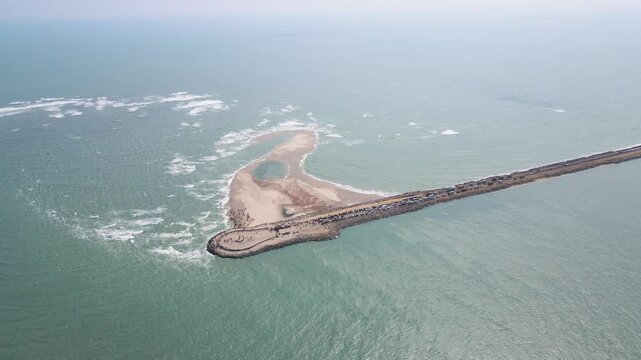 Picturesque aerial drone shot of Dhanushkodi, with the last road cutting through its deserted beauty.
