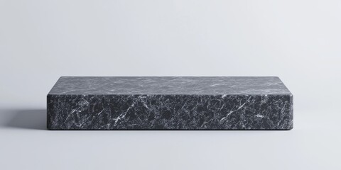 The granite podiums with a black frame stand out against a white background. They are perfect for displaying luxury products, measuring 25x11 inches in size.