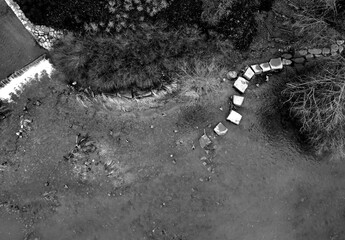 newly created natural embankment by river. benches, terraces, relaxed staircase serve people as well as fishing and relaxation. strengthening banks against water erosion by large stones on dry lined 