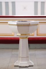 A wooden baptism bowl