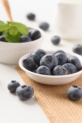 Close up of fresh blueberries for healthy food on white background.