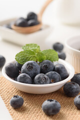 Close up of fresh blueberries for healthy food on white background.
