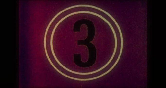Vintage Film Leader Countdown. Authentic Projected Head Leader with Marks, Scratches, and Film Grain for Timeless Retro Video Intros.