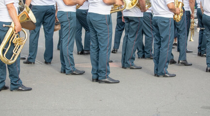 Police force officers with a musical instruments in the city.