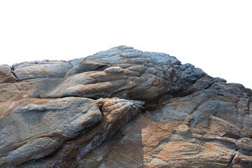a sunlit rock cliff isolated against a white background. The sun casts warm tones and shadows across the rocky surface