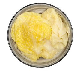 Fresh Sauerkraut in bowl from white cabbage leaves isolated on white background, top view
