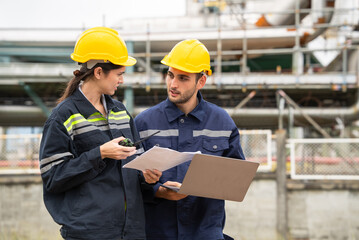 Engineer worker checking project at petrochemical factory or refinery oil plant industrial. Survey and inspecting for safety and quality of the production