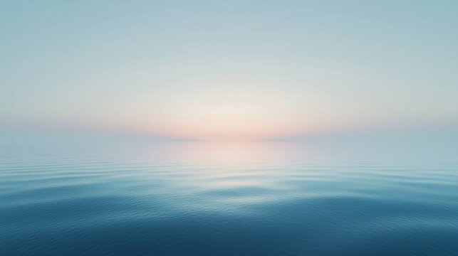 Tranquil Ocean Horizon Under a Clear Blue Sky at Dawn