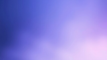 Obraz premium A soft, blurred gradient background transitioning from a deep, rich blue to a delicate, pale purple.