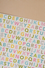 decorative scrapbooking paper with alphabet