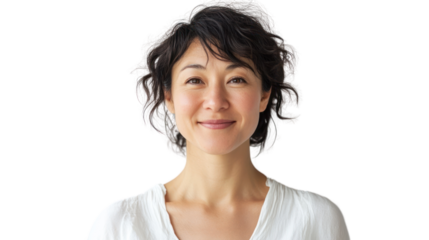 A smiling woman with curly hair, radiating warmth and positivity. The portrait captures a genuine moment of happiness and confidence.