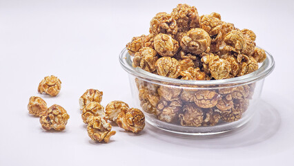 A vertical shot of caramel popcorn with extra cajeta