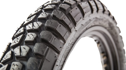 Close-up view of a rugged tire designed for off-road adventures, showcasing its tread patterns and durable construction for optimal traction.