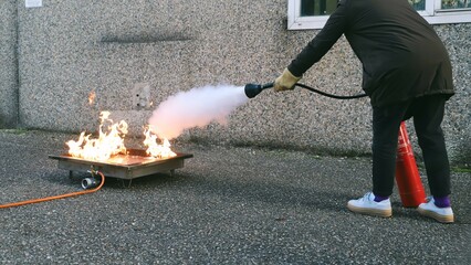 fire prevention. corporate safety - exercise during a firefighting course