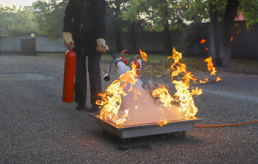 fire prevention. corporate safety - exercise during a firefighting course