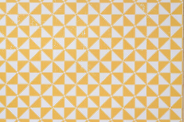 Fototapeta premium decorative scrapbooking paper with yellow and white pin-wheel pattern