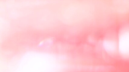 Gentle pink background with glitter spots and gradient. Light effect background 