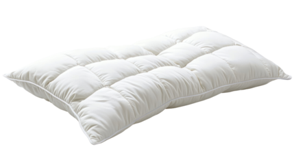 A soft, plush white pillow rests gently, offering comfort and support for a restful sleep. Ideal for enhancing bedroom aesthetics and relaxation.