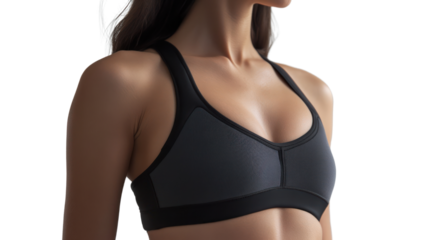 A woman in a sleek black sports bra displays confidence and empowerment, embodying modern fitness and active living, perfect for promoting healthy lifestyles.