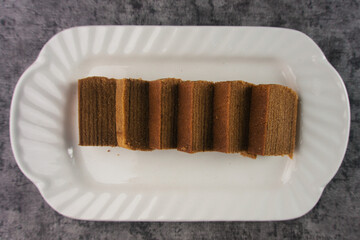 Lapis legit or spekuk (Dutch: Spekkoek) is a type of traditional wet cake from Indonesia.