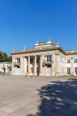Naklejka premium Lazienki Palace on island inside Łazienki Park portrait format in Warsaw, Poland