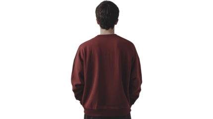 A young man stands with his back to the camera, wearing a casual maroon sweatshirt. The scene conveys comfort and modern style, perfect for lifestyle themes.