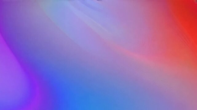 Close up shot of shimmering gradient overlay, dynamically shifting in color with smooth animated opacity transition, creating a mesmerizing fluid motion effect on a vibrant background.
