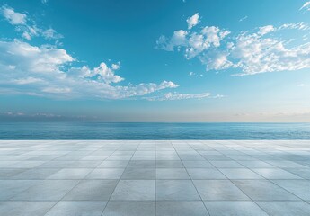 Expansive View of Serene Ocean and Vibrant Sky with Wispy Clouds Above a Modern Tiled Terrace Overlooking Calm Water at Sunrise or Sunset