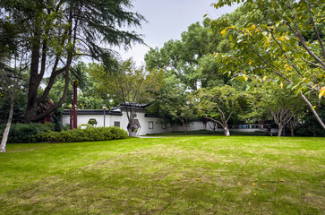 Tranquil Garden Escape Surrounded by Lush Greenery and Traditional Architecture