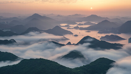 The sun rises from behind the mountains, and clouds cover them like fog on the green hills below. The sea of ​​clouds is right in front of you, and some mountain peaks stand above the sea of ​​clouds.