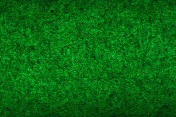 Green abstract texture with fibers through a green light