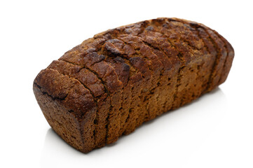 Freshly baked artisanal loaf resting on a smooth white surface, showcasing its crusty exterior and inviting aroma