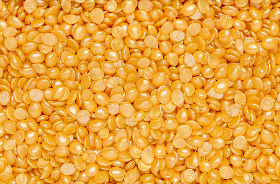 Macro background photography of cosmetics hard wax beads, waxing, hair removal, depilation, spa salon, beauty procedure, advertisement
