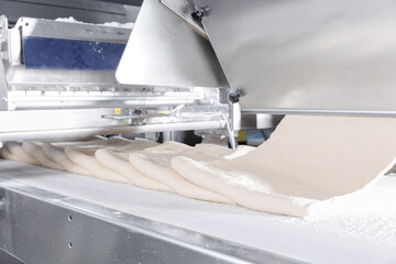 Automated puff pastry dough formation in confectionery production line