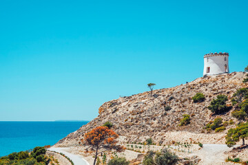 Fototapeta premium Beautiful Villajoyosa town in Spain. View to clifftop Malladeta in La Vila Joiosa to the Tower Malladeta
