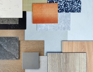Fototapeta premium close up view of interior materials mood and tone board contains tiles, wooden veneer, vinyl flooring tiles, artificial stones, concrete laminated, black terrazzo. materials scheme for selection.