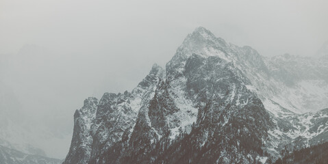 High Tatra Mountains covered in snow. Holidays in Poland. Travel destination. Vacation in Poland. Hiking and skiing in mountains. Tatra National Park