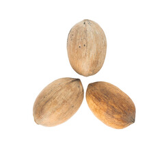 Three whole walnuts with shells on a white background