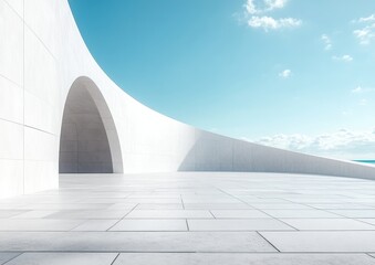 Modern architectural design featuring a sweeping white wall and an archway under a bright blue sky, creating a serene and minimalist outdoor space