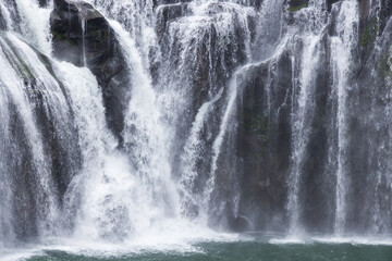 Taiwan Shifen waterfall surrounded by lush green nature