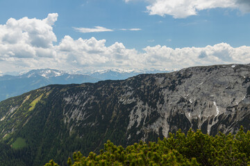view from the Bärenkopf in Karwendel Mountain area alps inside the deep alps with snow and clouds