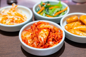 Assorted Korean side dishes on table