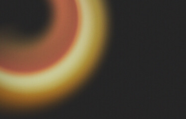 Yellow orange light red dark grainy glow abstract background. 4K digital grainy gradient. Grainy noise texture poster header cover wallpaper banner backdrop design template.