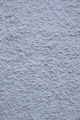 Rough white lime wall. Concept: Building, architecture, pattern, black brick.