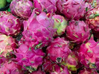 Obraz premium Vibrant Pink Dragon Fruit Pile A CloseUp Lush Still Life