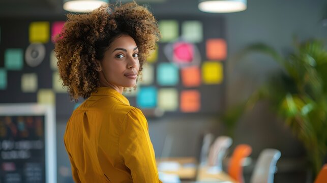  Close-up of a wellness coach providing stress management tips to employees in a workshop setting. 