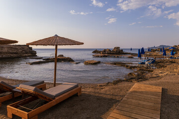Sunset on the beautiful Oasis beach on the island of Rhodes in Greece. Seascape