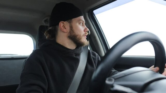 emotional male driver reacts emotionally while driving